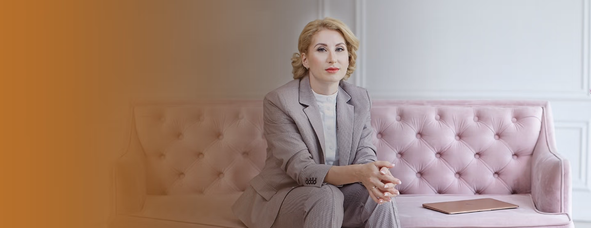 a woman sitting on a couch